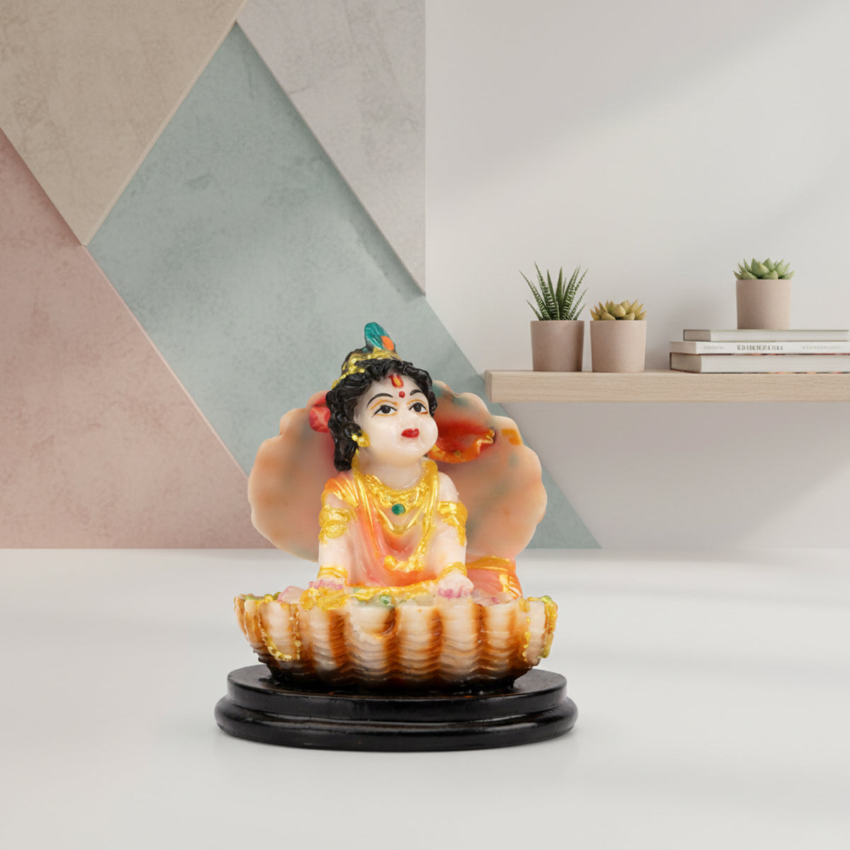 The Writershub Bal Krishna Sitting in Shell Showpiece - Multicolour Resin Decor