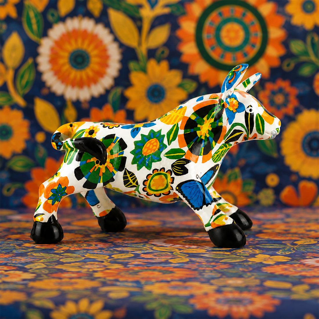 The Writershub Hand-Painted Floral Cow Figurine Showpiece – Multicolour Resin Décor
