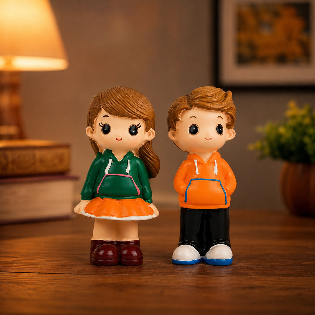 Set of Polyresin Couple Figurines Boy Girl Orange Red