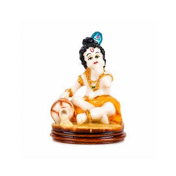 Lord Bal Krishna Statue Sitting with Butter Pot – Yellow & Gold Polyresin