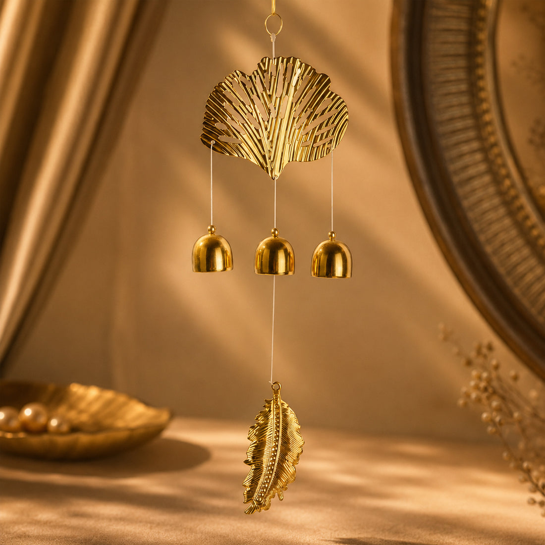 The Writershub Gold Metal Leaf Wind Chime with Hanging Bells