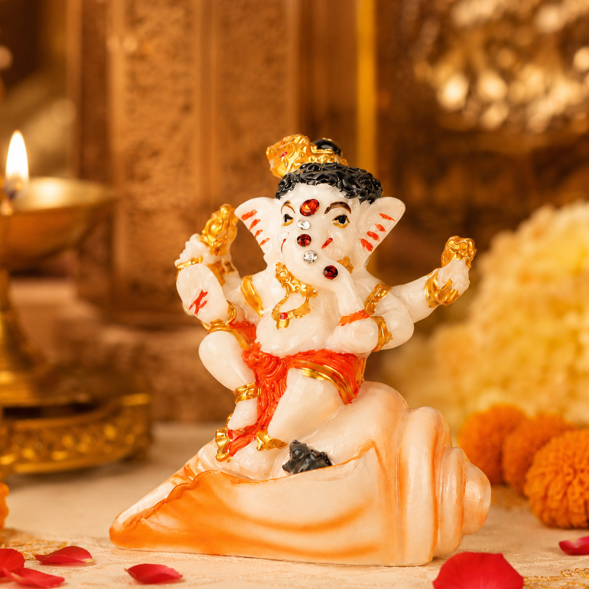 The Writershub Orange Dhoti Lord Ganesha Sitting on Shankh Resin Statue