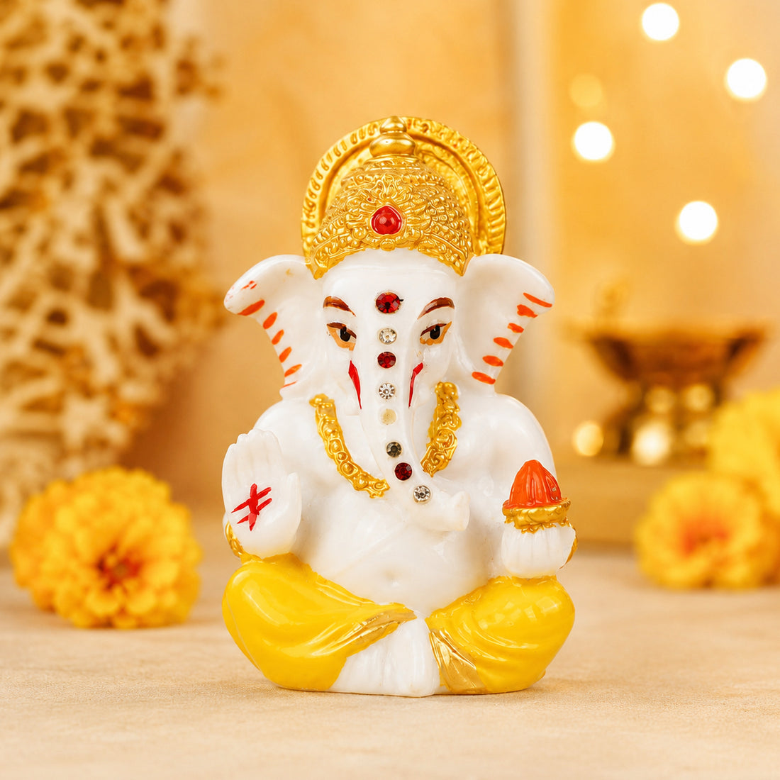 The Writershub Lord Ganesha Seated Yellow Dhoti Polyresin Statue - 9.3cm